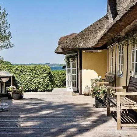 펜션 Reetdach-ferienhaus-mit-traumhaftem-panoramameerblick