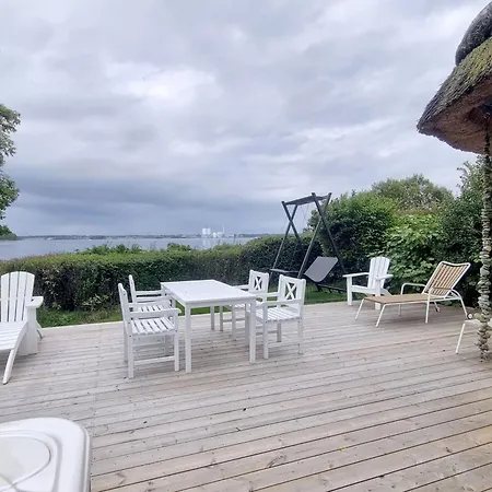 펜션 Reetdach-ferienhaus-mit-traumhaftem-panoramameerblick